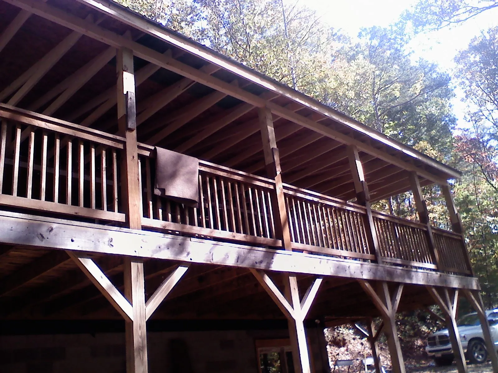 Timber framing under a new elevated porch and deck — Roof Leak Repair in Weymouth by Roofing Brothers
